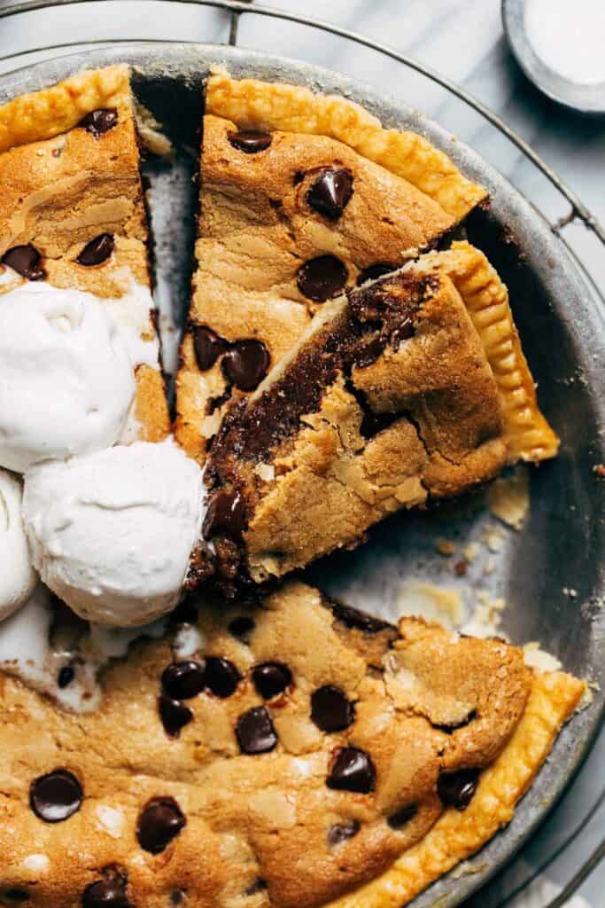 close up on a slice of peanut butter chocolate chip cookie pie