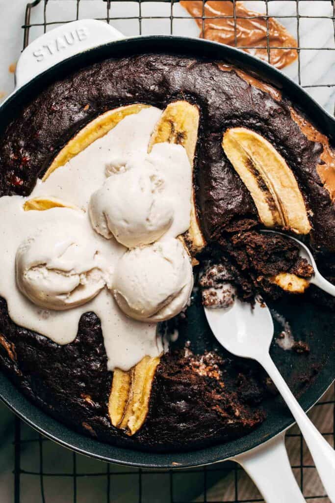 a chocolate banana skillet cake with ice cream on top