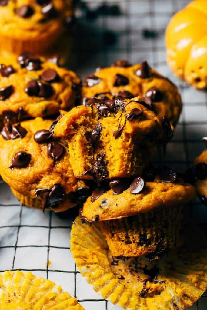 a stack of pumpkin chocolate chip muffins