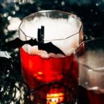 smoke bubbling up from a mezcal Negroni