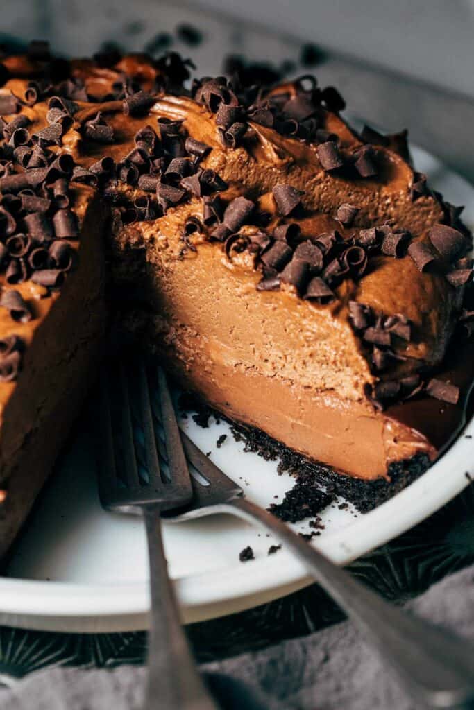 inside a sliced chocolate pie with a chocolate filling and chocolate mousse topping
