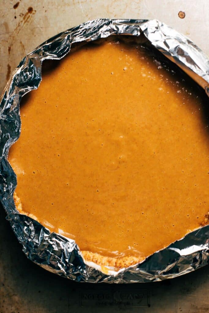 pumpkin pie filling in a prebaked crust