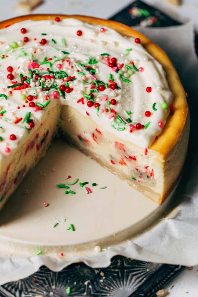 inside a sliced cheesecake with sugar cookie dough bites