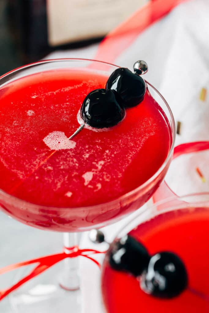 amaretto cocktail with cherry garnish