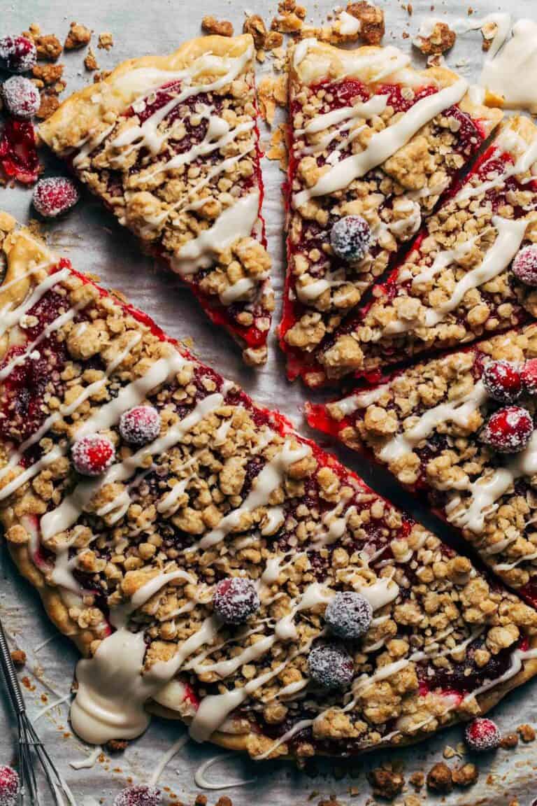 the top of a sliced cranberry pie