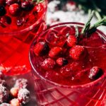 the top of a cranberry limoncello spritz garnished with cranberries