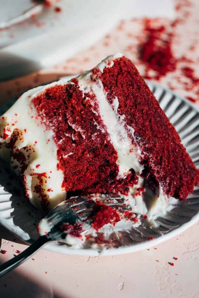 a slice of red velvet cake made without food dye