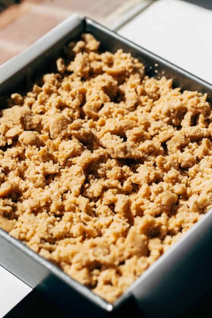 coffee cake batter topped with crumble before baking