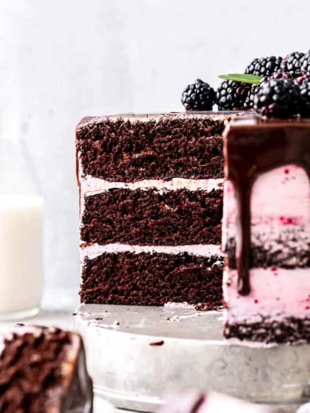 the inside slice of a blackberry chocolate cake