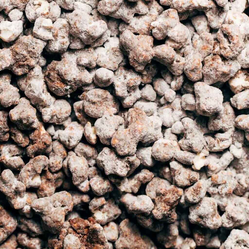 close up of double chocolate popcorn puppy chow