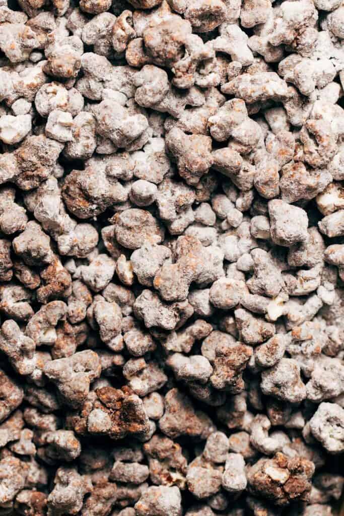 close up of double chocolate popcorn puppy chow mix