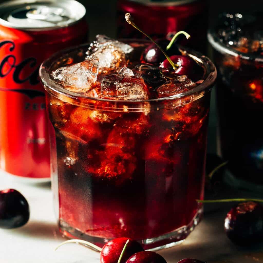 a diet coke margarita with cherries