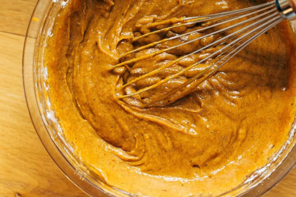 process shot whisking pumpkin bread batter