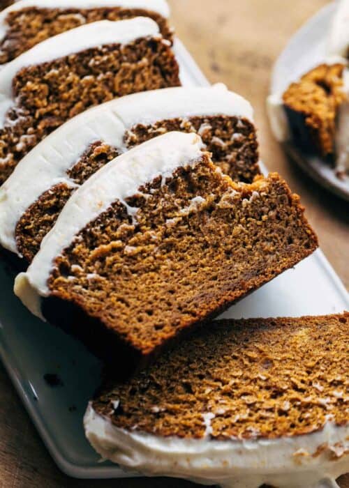 bite shot of cream cheese frosted pumpkin bread