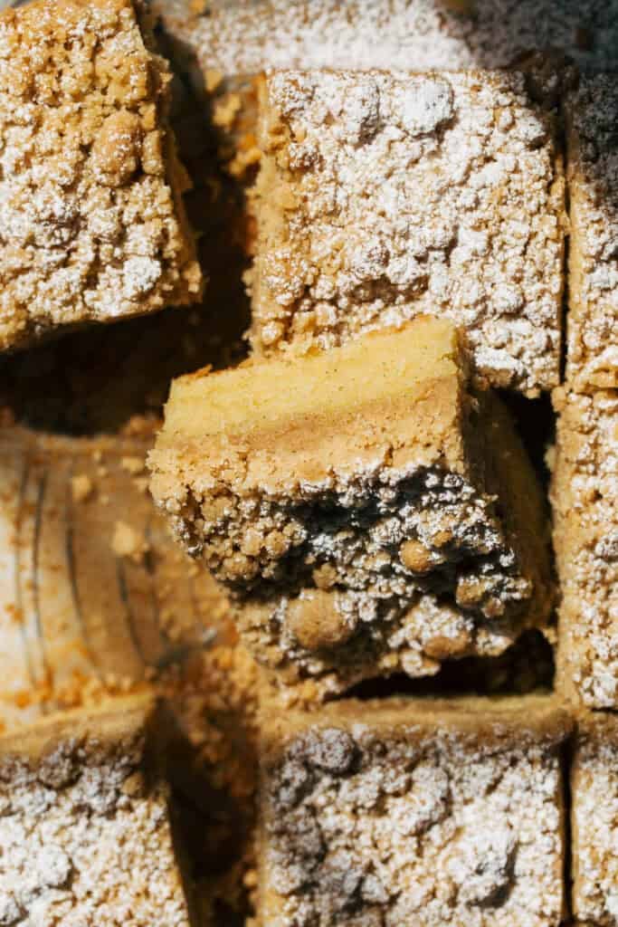 a coffee cake slice with powdered sugar