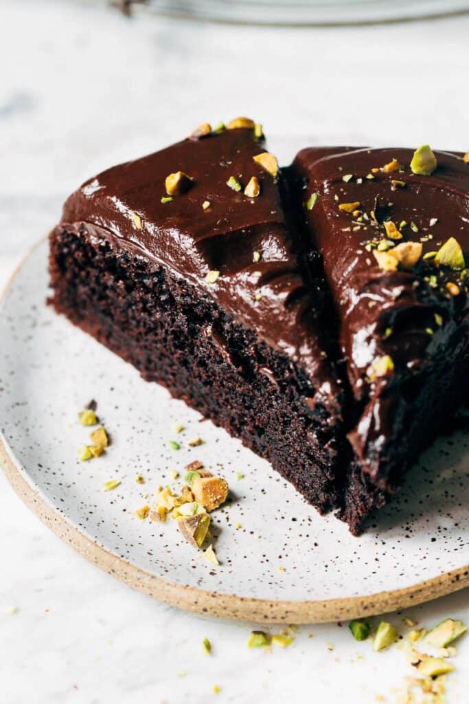 close up on sliced chocolate olive oil cake