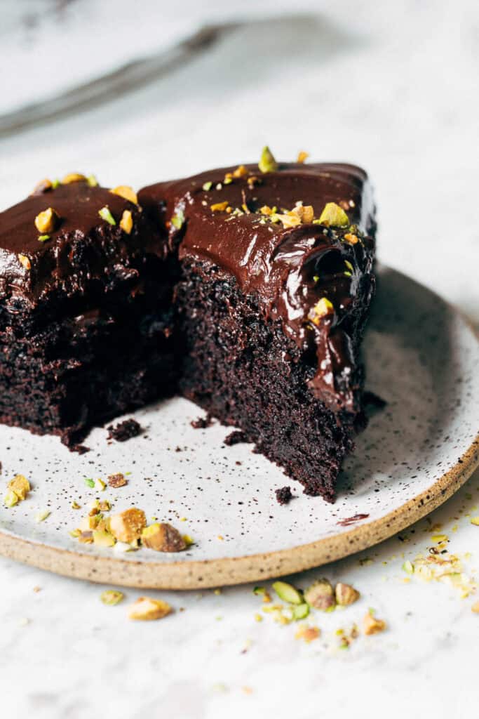 close up on slice of chocolate olive oil cake