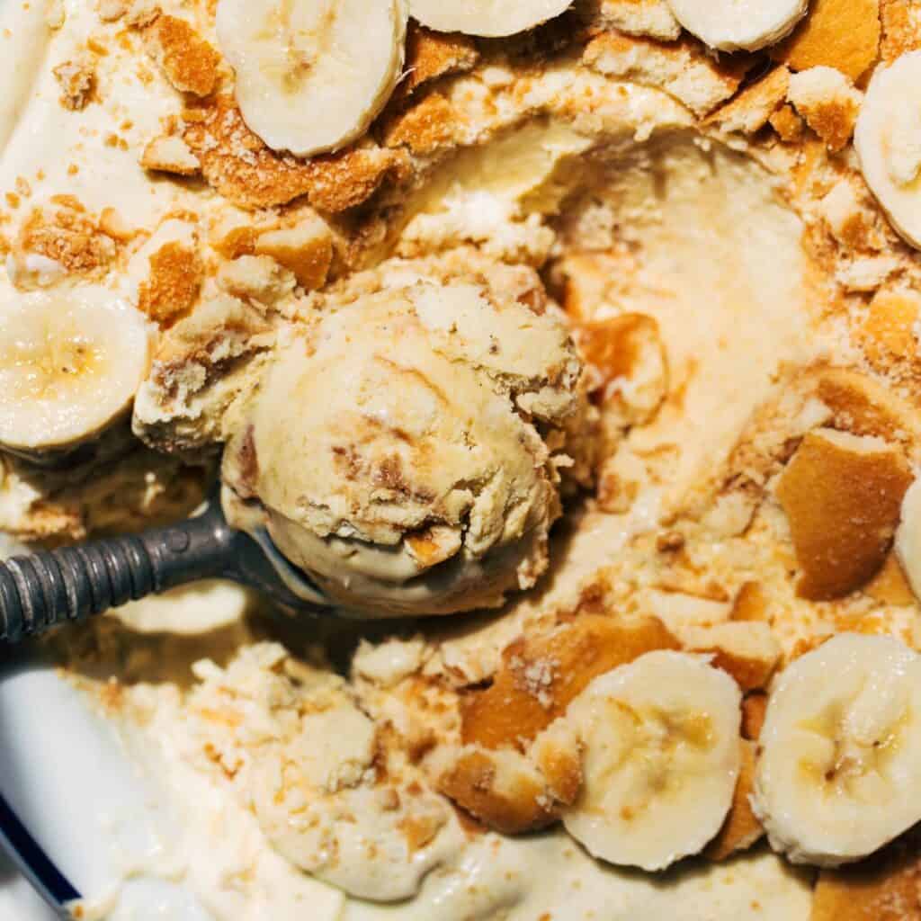 a scoop taken from banana pudding ice cream