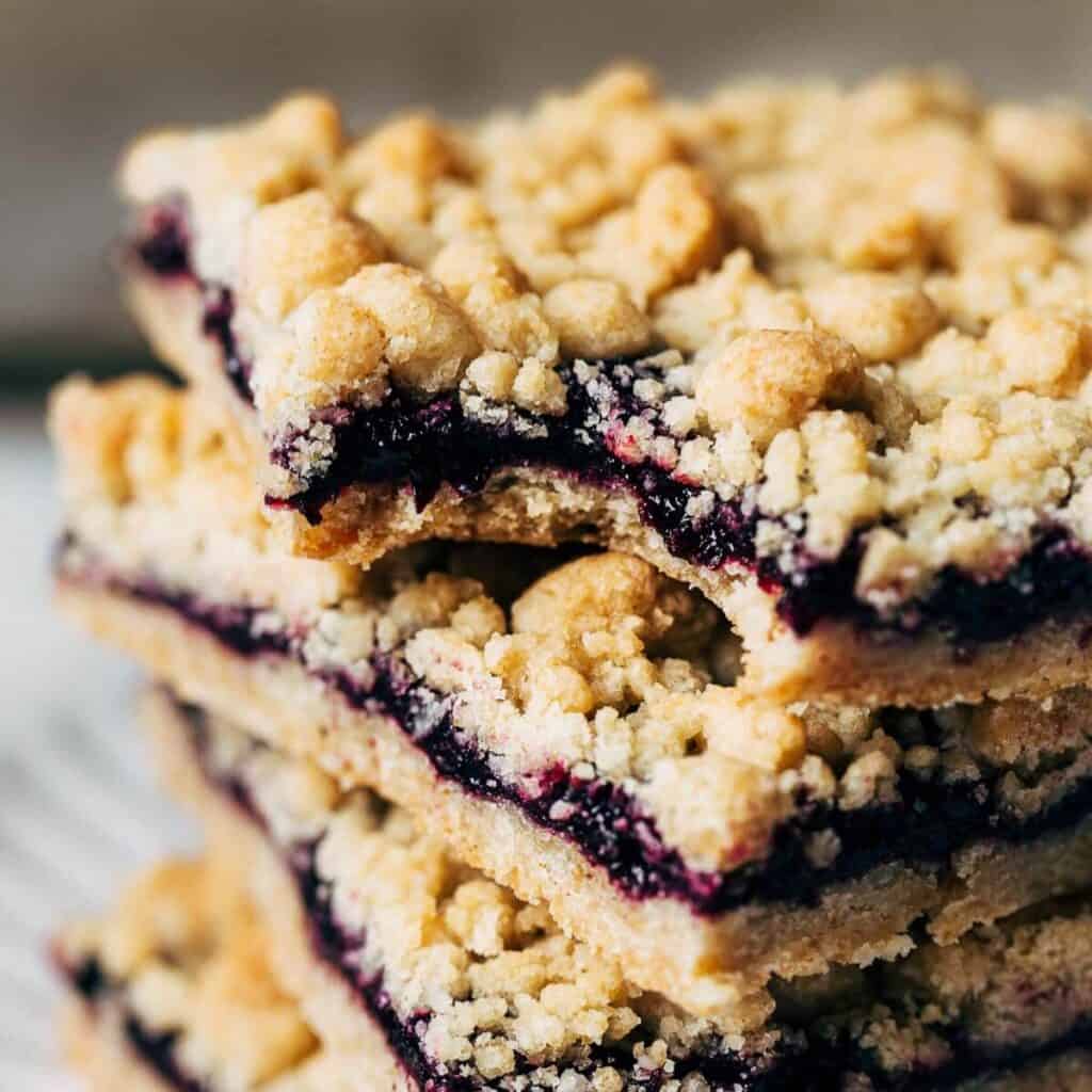 bite shot of wild blueberry crumble bars