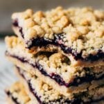 bite shot of wild blueberry crumble bars