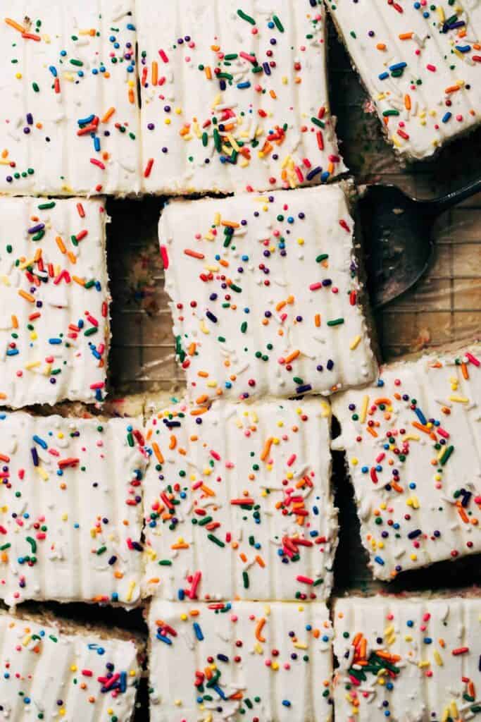 overhead shot of sliced funfetti sheet cake