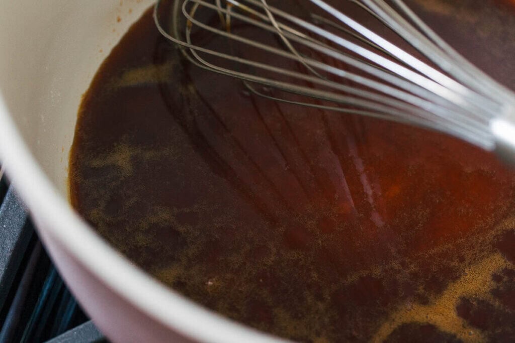 process shot of burnt sugar in a pot