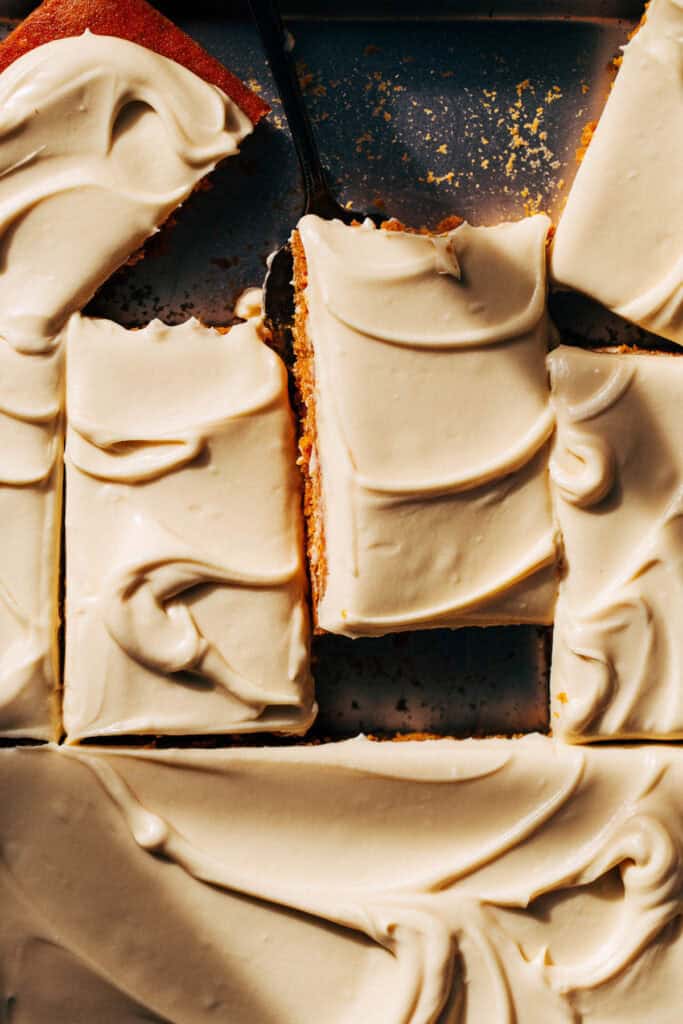 overhead shot of sliced and frosted pumpkin bars