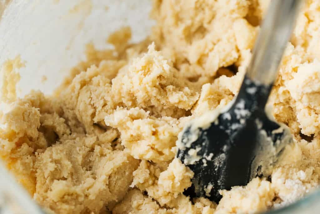 process shot mixing sugar cookie dough