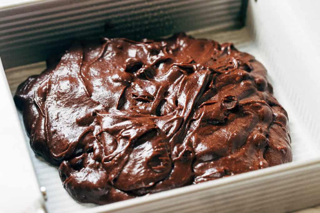 brownie batter in the baking pan