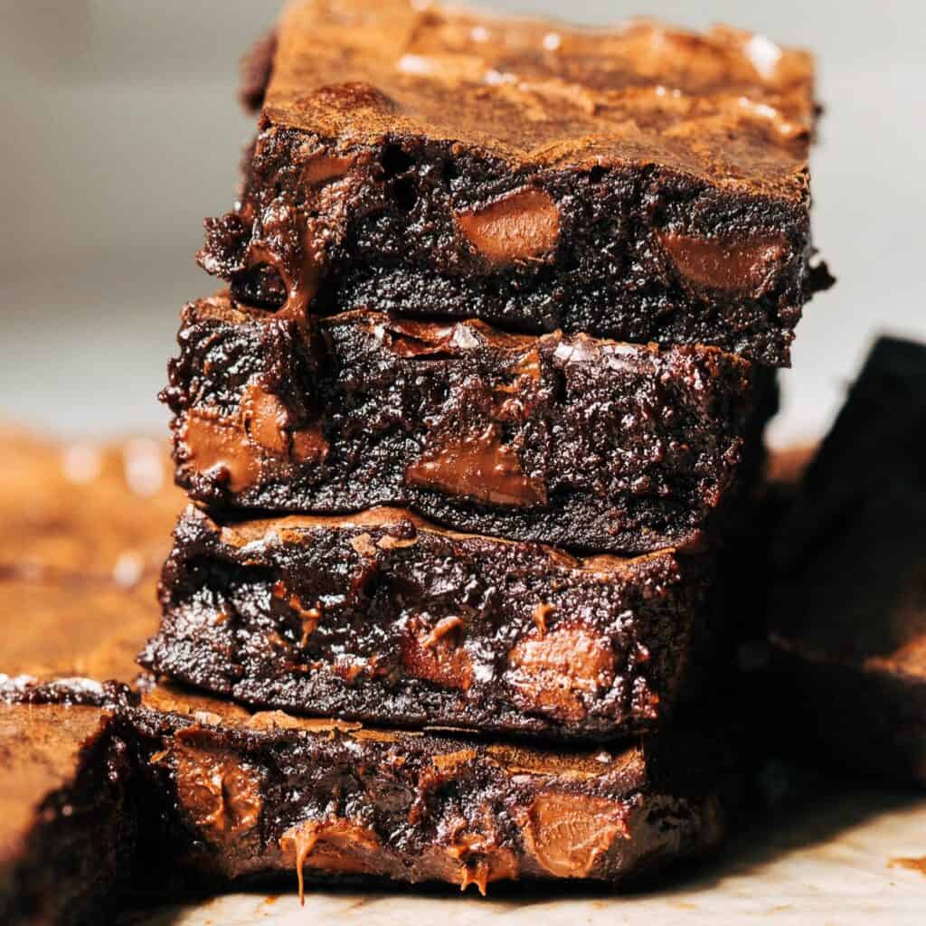 a stack of super fudgy brownies