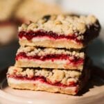 stacked raspberry cheesecake crumble bars