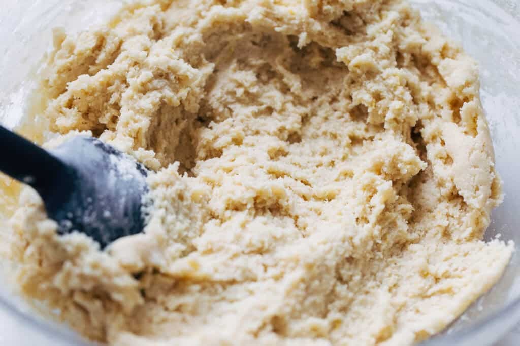 process shot mixing lemon sugar cookie dough