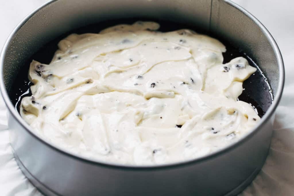 process shot spreading cream cheese filling