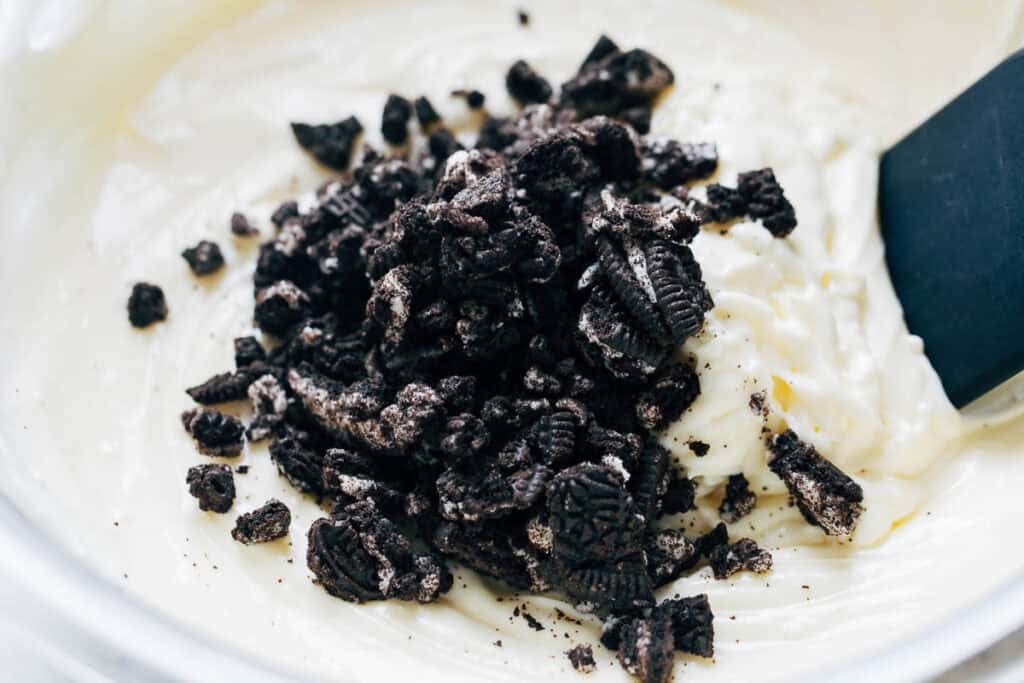 process shot mixing crushed Oreos into cream filling
