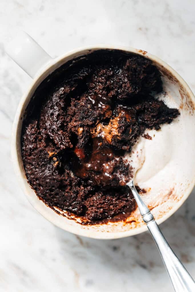 overhead shot of chocolate mug cake with ice cream