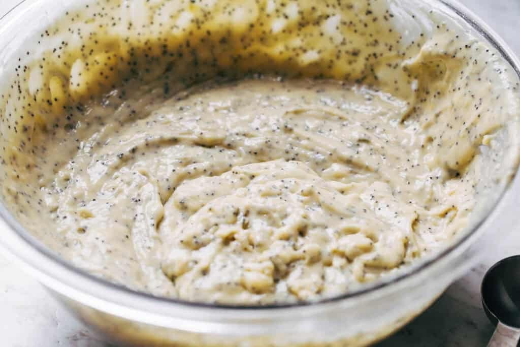 process shot mixing lemon poppy seed bread batter