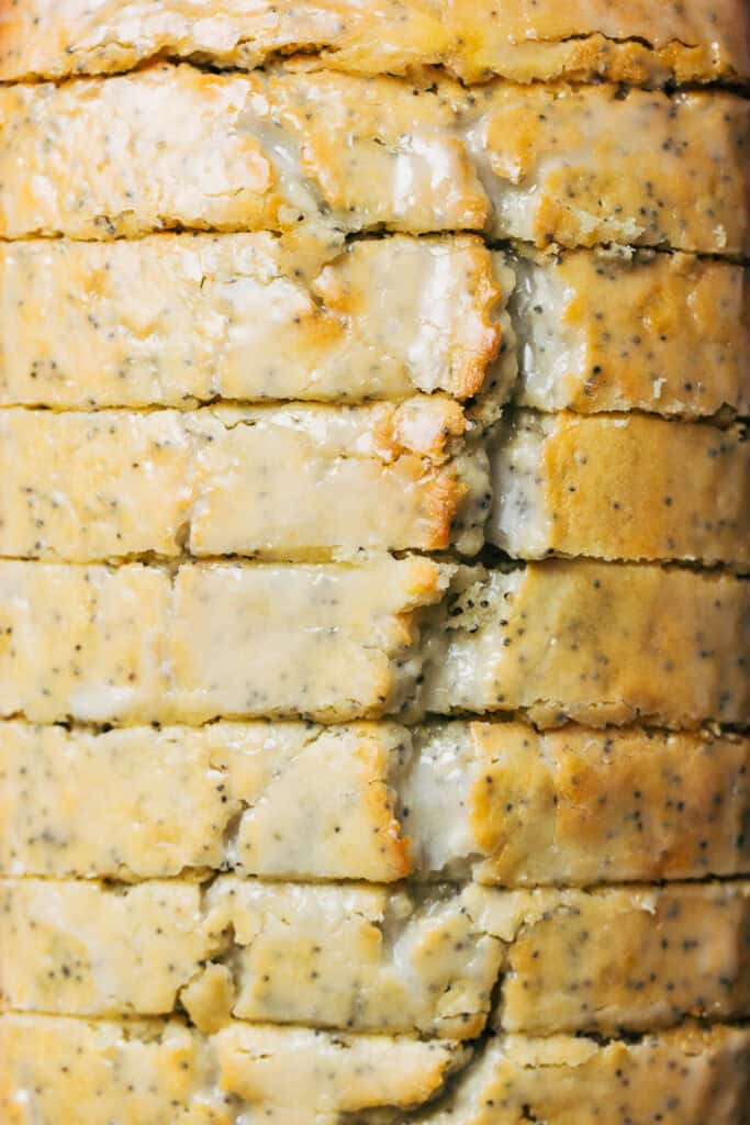 close up on sliced top of lemon poppy seed bread
