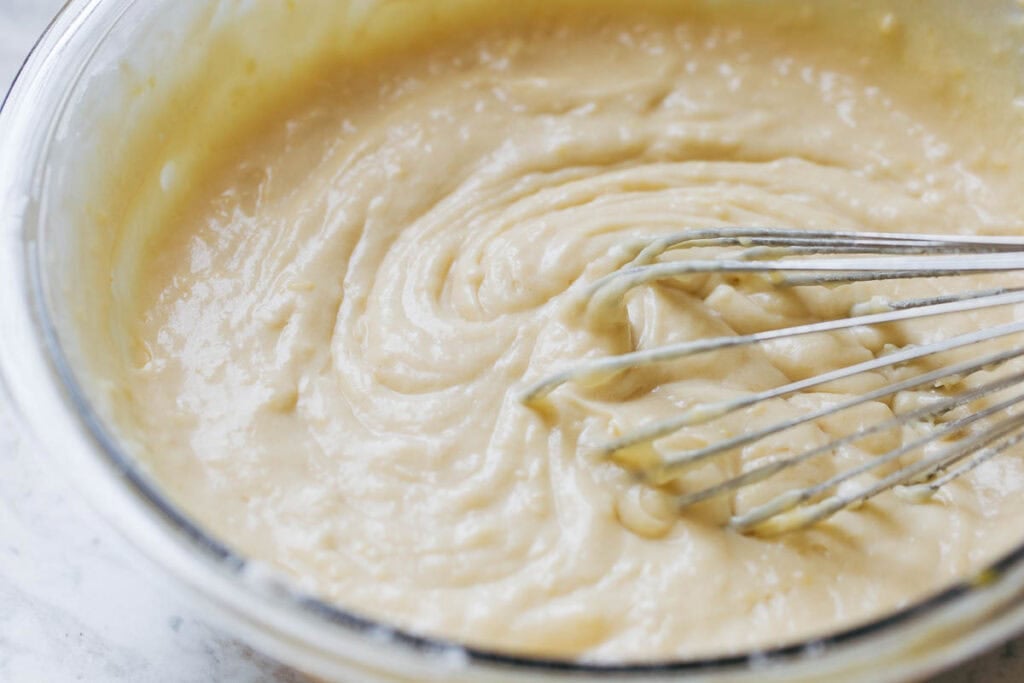 process shot mixing lemon yogurt cake batter