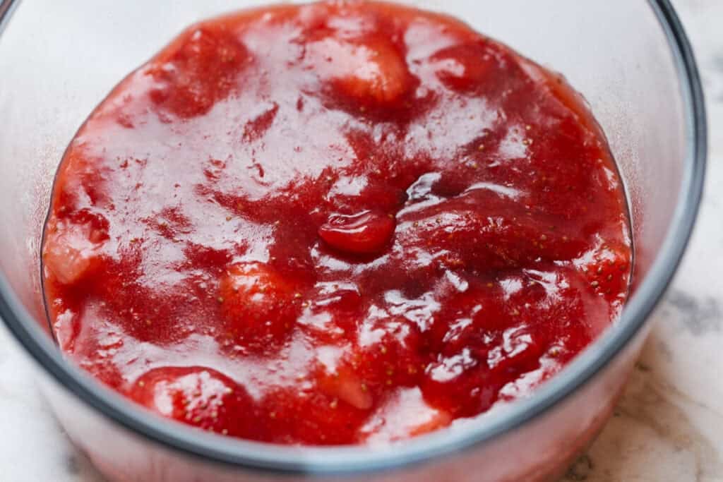 process shot of strawberry sauce