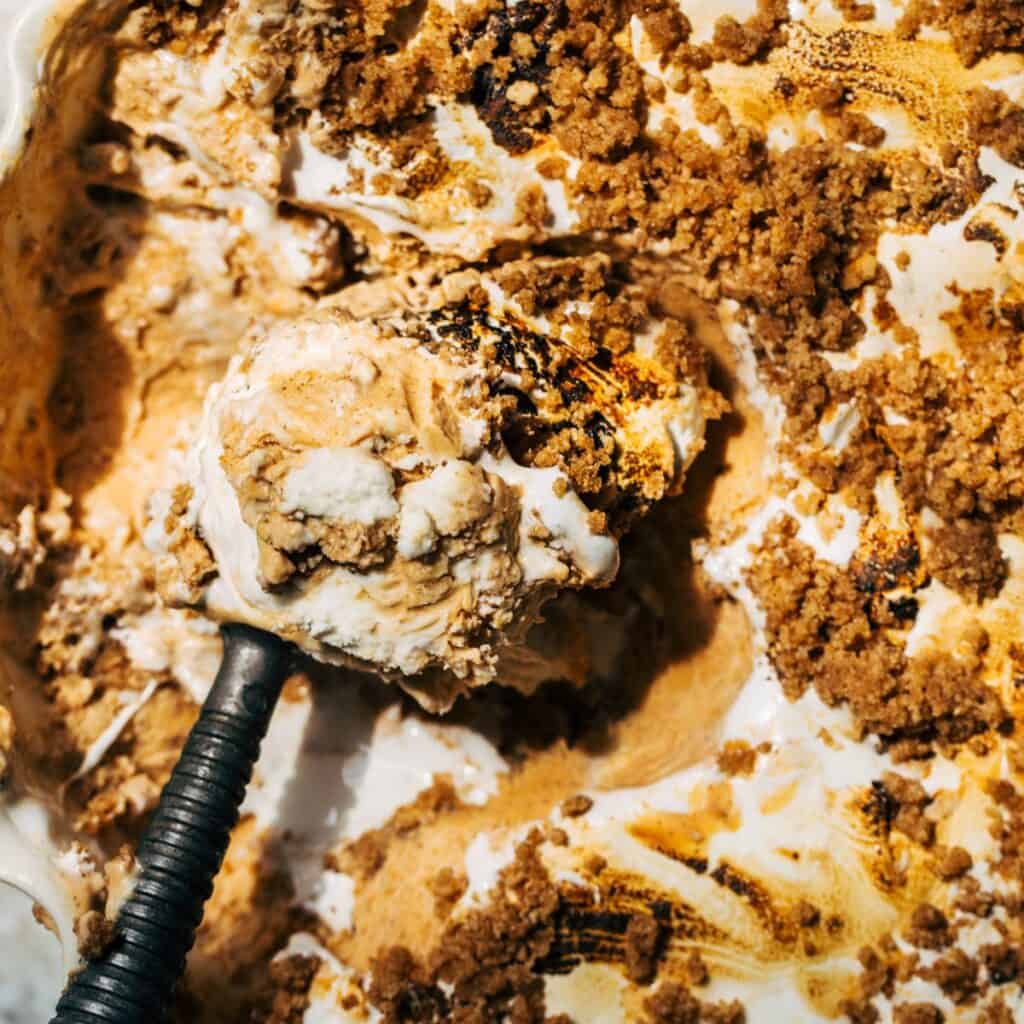 scooping toasted marshmallow pumpkin ice cream