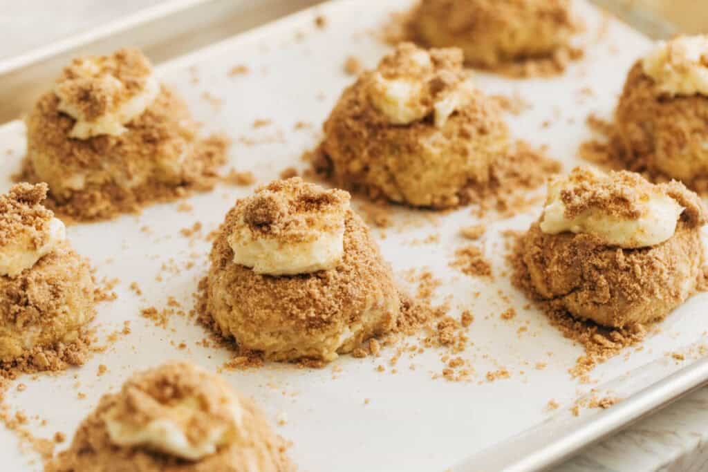 prebaked muffin tops with crumble and cream cheese filling