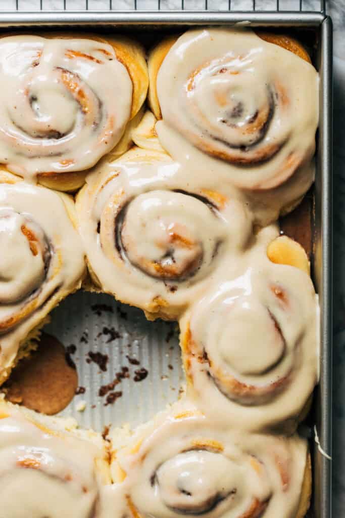overhead shot of iced maple cinnamon rolls